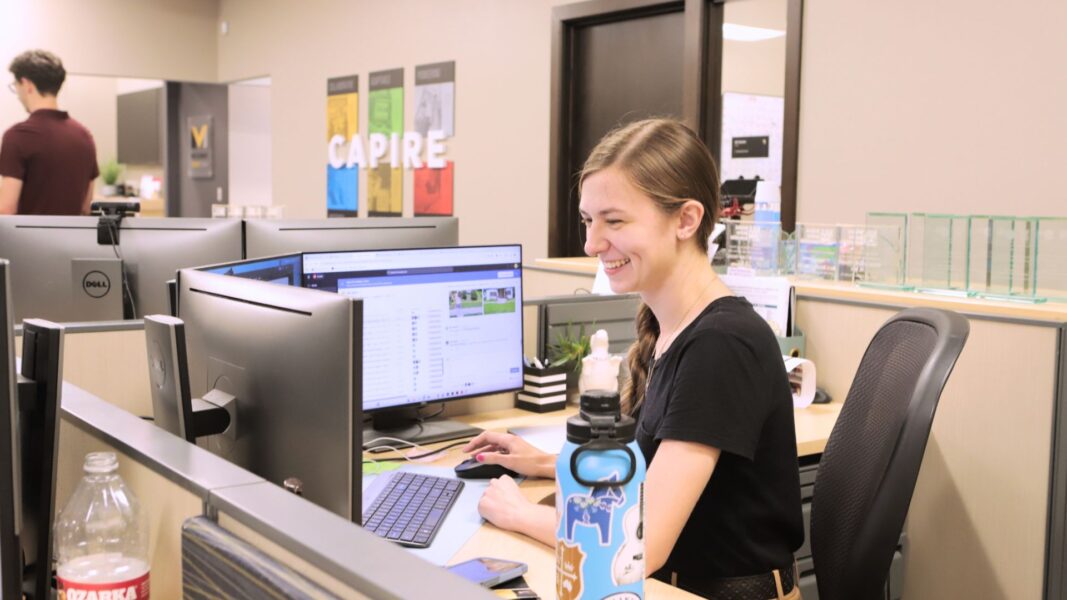 Strickbine works at her office cubicle at McCurdy.