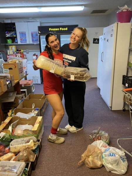 Women's soccer team volunteers at Shepherd's Heart Food Pantry.