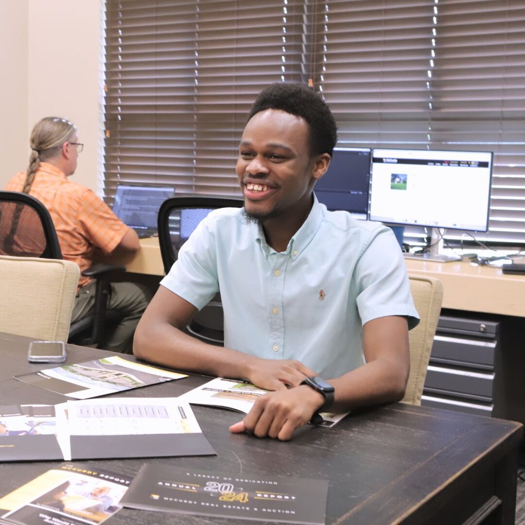 Lotsu-Morgan collaborates with a team member during his internship