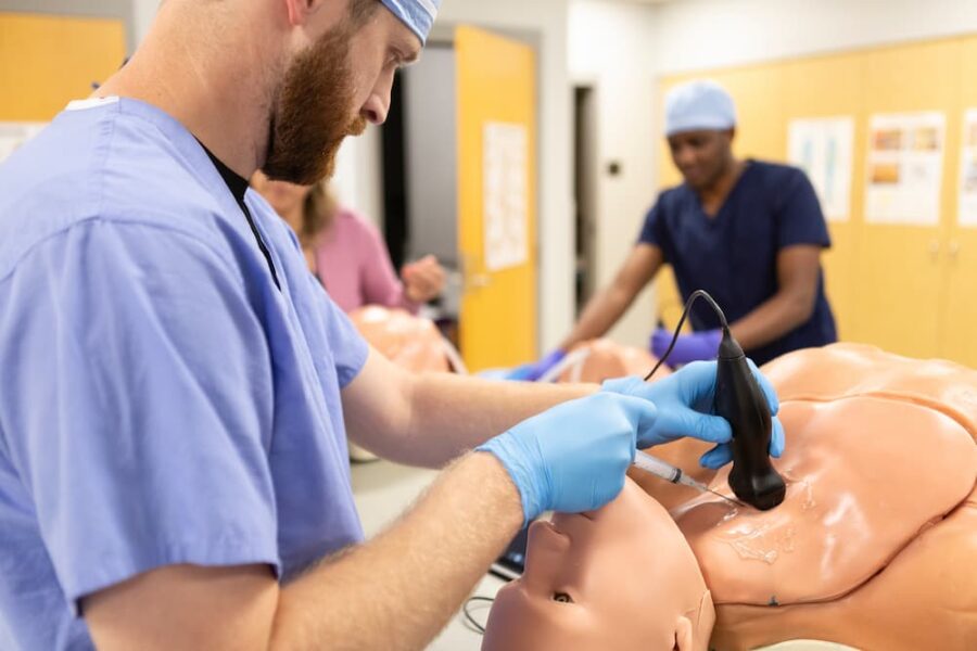 Students of the Doctor of Nurse Anesthesia Practice program at Newman University work hands-on in the classroom.