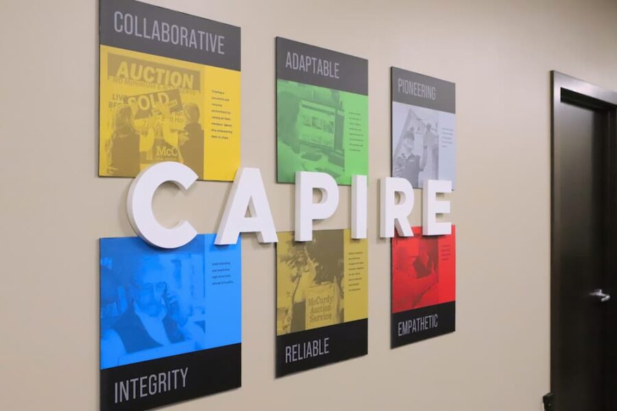 "CAPIRE," which means "to understand," adorns a wall in the McCurdy office, highlighting the organization's core values.