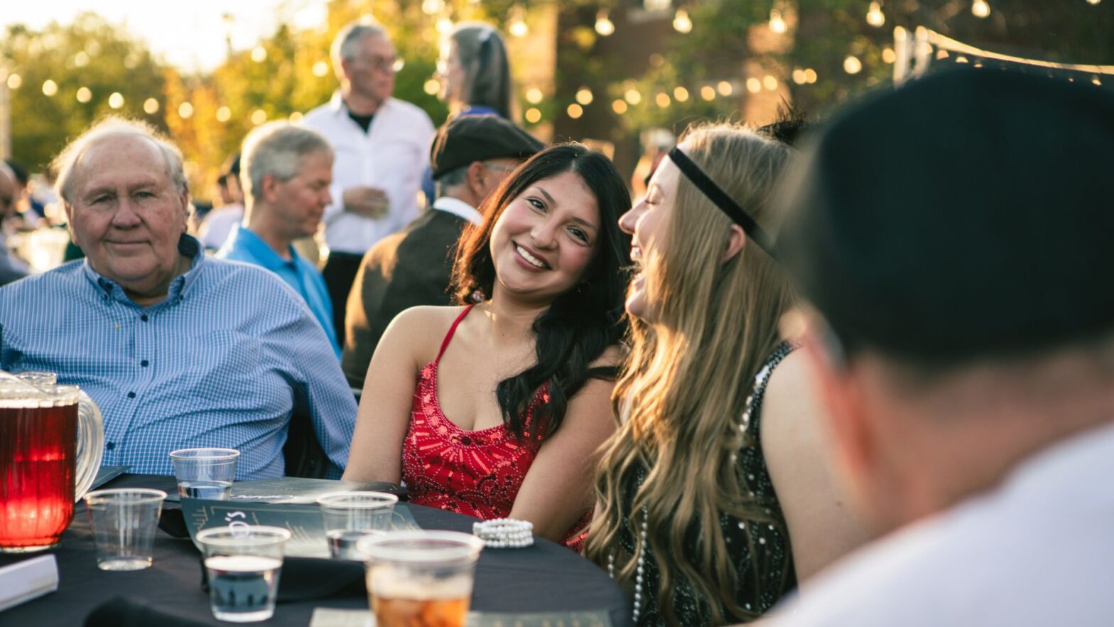 Guests smile and enjoy their time at Party on the Plaza at Newman University.