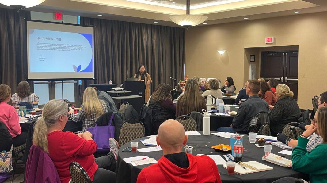 Rials speaks on traumatic brain injuries and the impacts on patients during a conference.