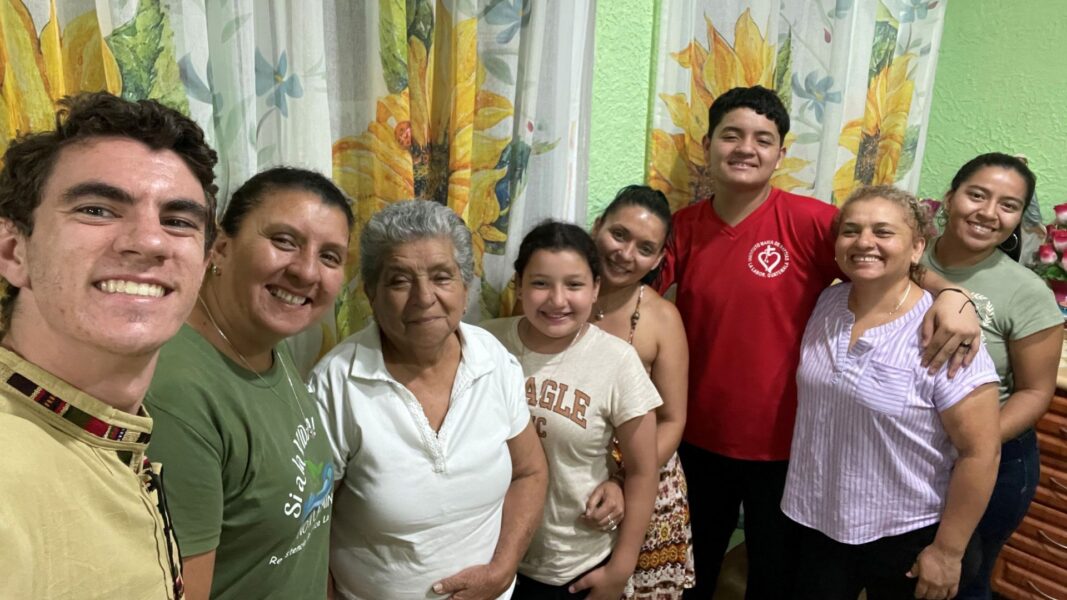 Elliott (left) with his host family in La Labor