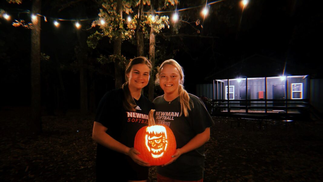 Schreiner (right) holds her carved Frankenstein pumpkin.