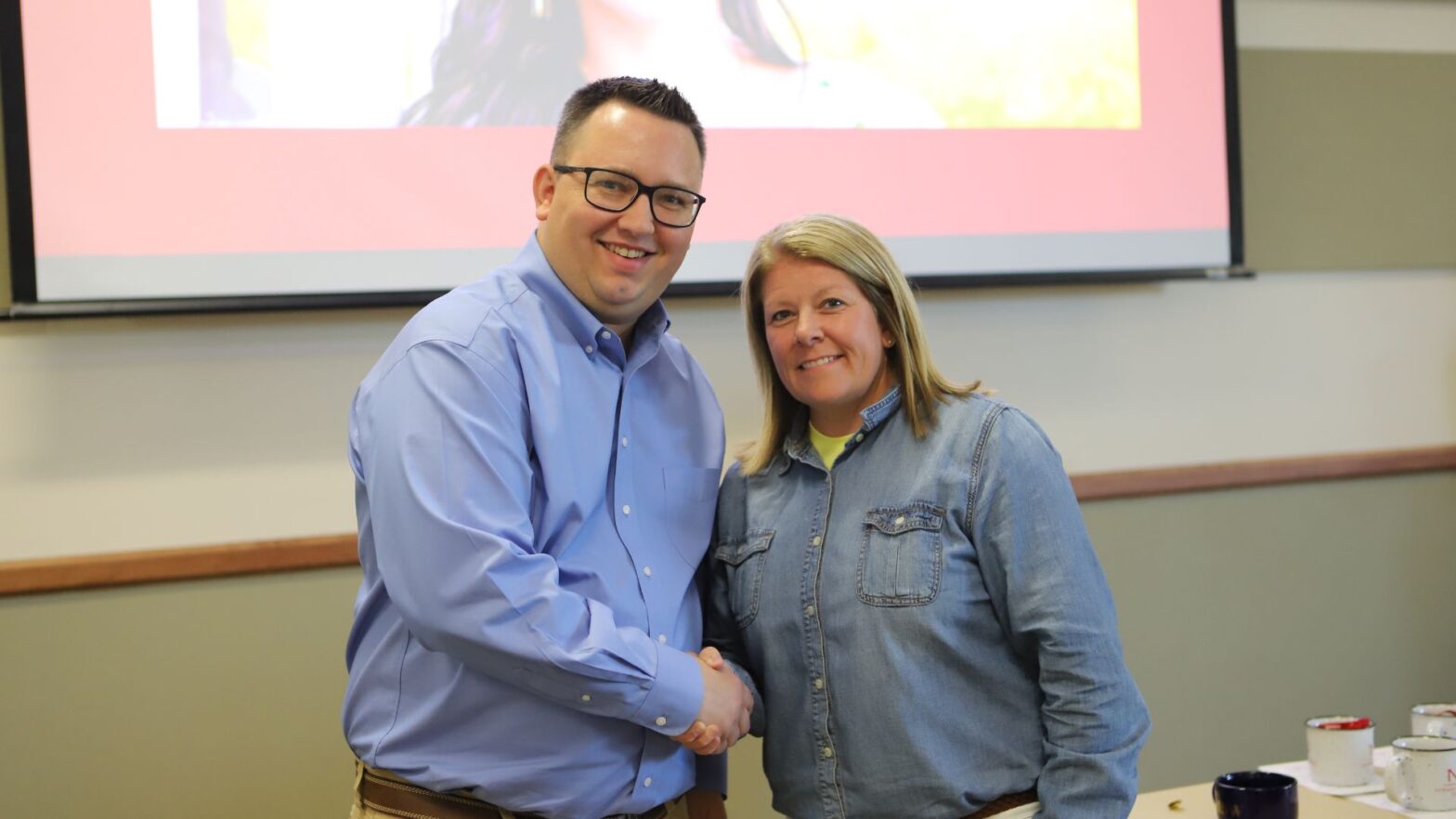 Saunders with Jessica Bird, associate vice president of outreach and dean of the School of Education and Social Work