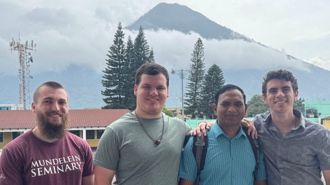 (From left to right) Seminarians Conrad Sissell and Dominic Jirak with Rev. Bob Pinninti and Elliott in Santiago Atitlán.