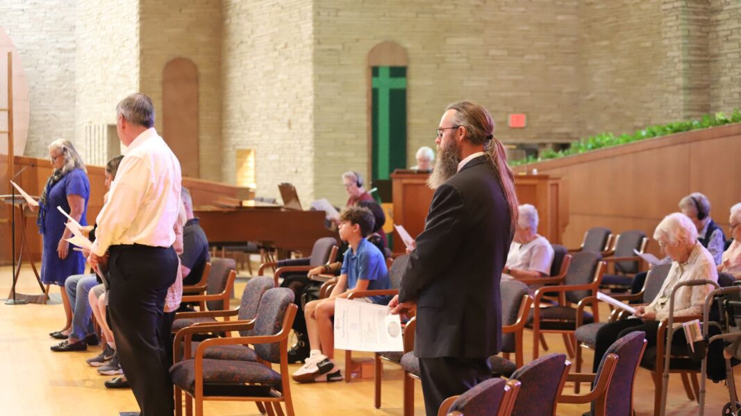 Umbarger stands in support of his fellow ASC Associates.