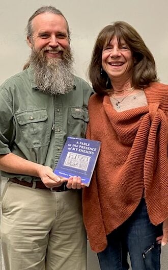 Pictures Umbarger and Baxt with Umbarger's book