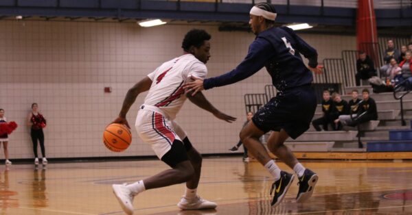 Men's basketball defeated Manhattan Christian during Kids Day on Nov. 25.