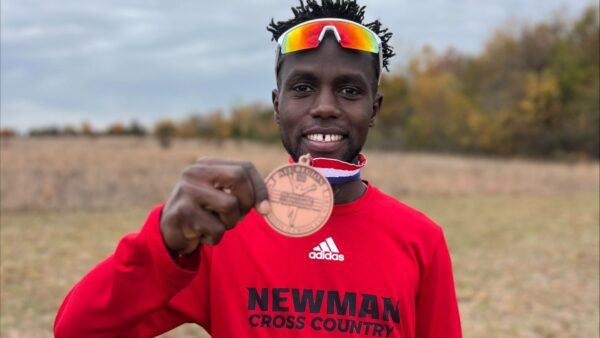 Kiprotich earning medalist award for Newman Cross Country