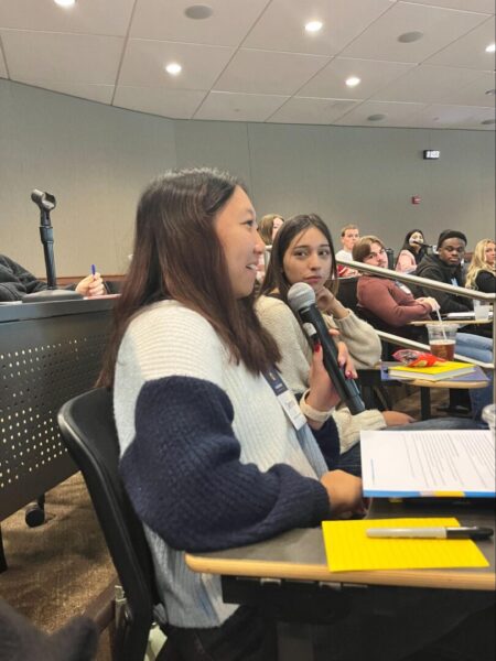 Newman student Jenna Ju responds to a question about freedom of expression.