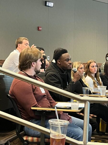 Newman student Kelly Lotsu-Morgan asks a question about freedom of expression on college campuses.