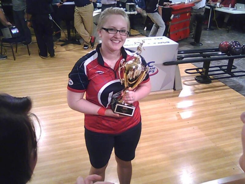 Pictures Drewes posing with her National Championship trophy