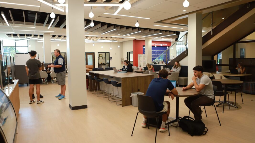 Students and coaches meet in the Student Success Center.