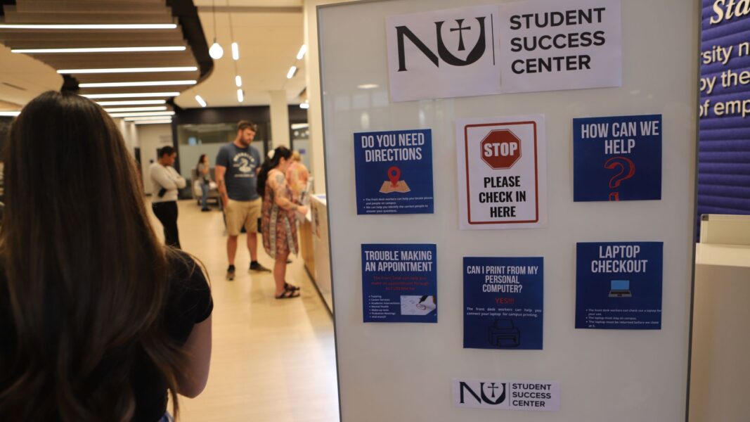 A sign in the Student Success Center lists the resources available to students.