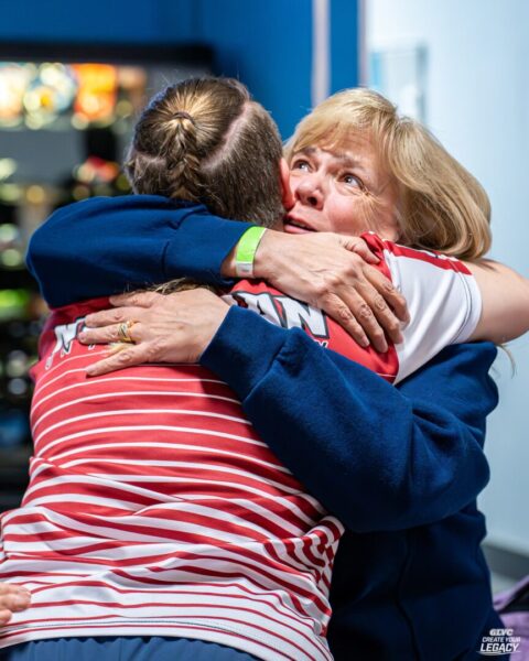 Walbaum and her mother embrace in a hug after her win. (Courtesy photo: GLVC)