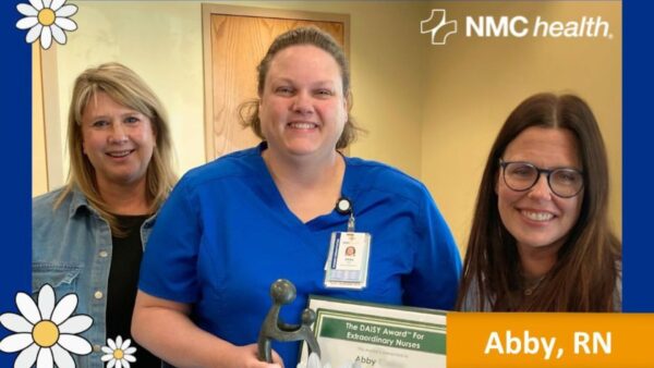 Walker (center) receives the DAISY Award for Extraordinary Nurses. (Courtesy photo: NMC health)