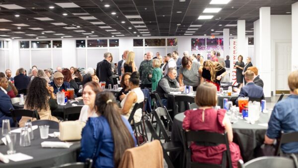 Faculty gather during the Faculty Excellence Awards Banquet in the fall.