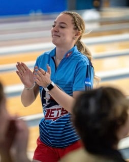Paighton Crumley, who earned All-GLVC Honorable Mention, applauds after a stellar shot. (Courtesy photo: GLVC)