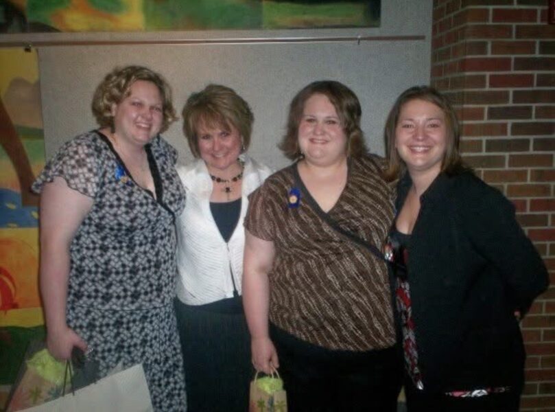 Walker (left) with family and friends at Newman University