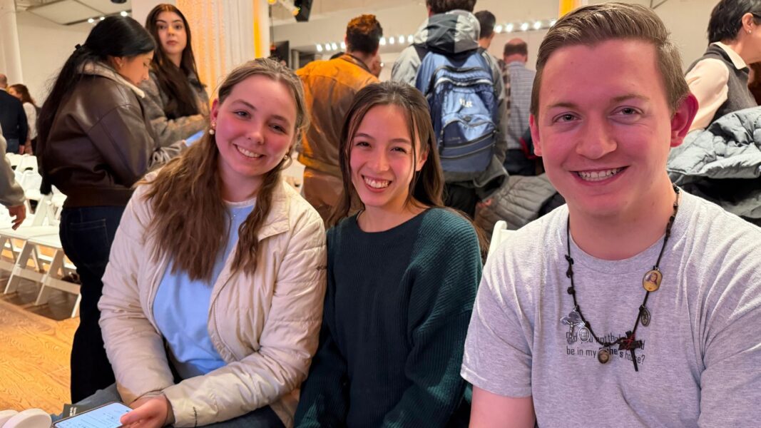 Hertel (far left), Eliana Gaytán and Elias Belton enjoy The New York Encounter conference.