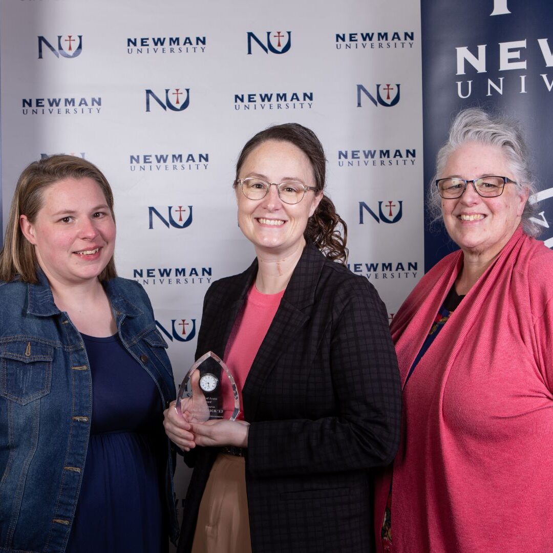 Hedrick (center) with family members
