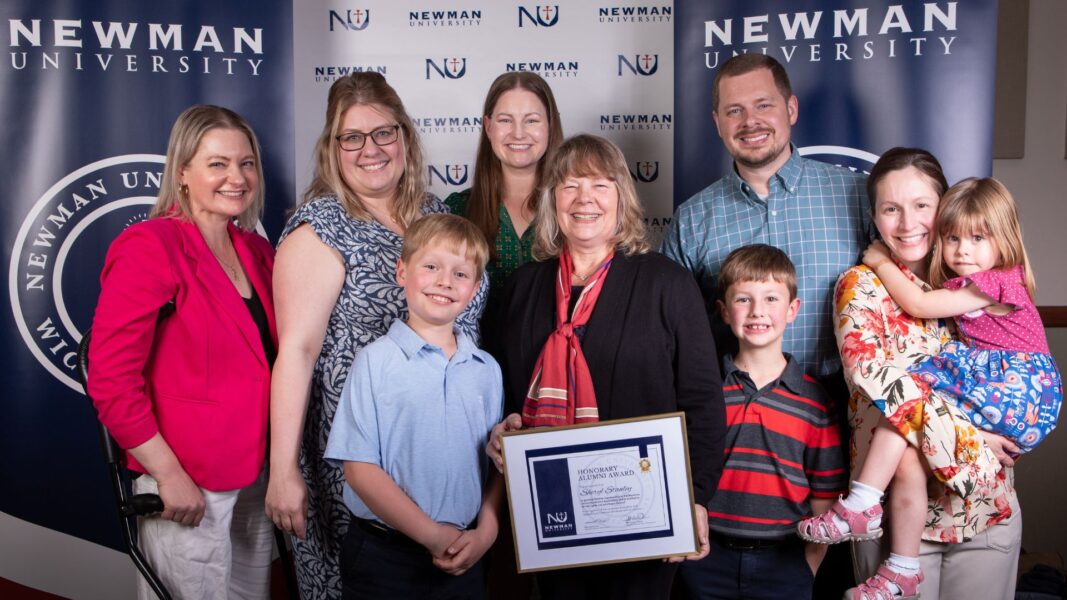 Stanley (center) with family members in support