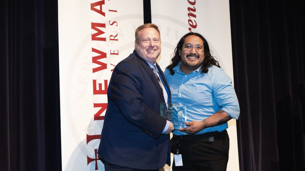 Stout awards Trevino the Fine Arts Achievement Award.