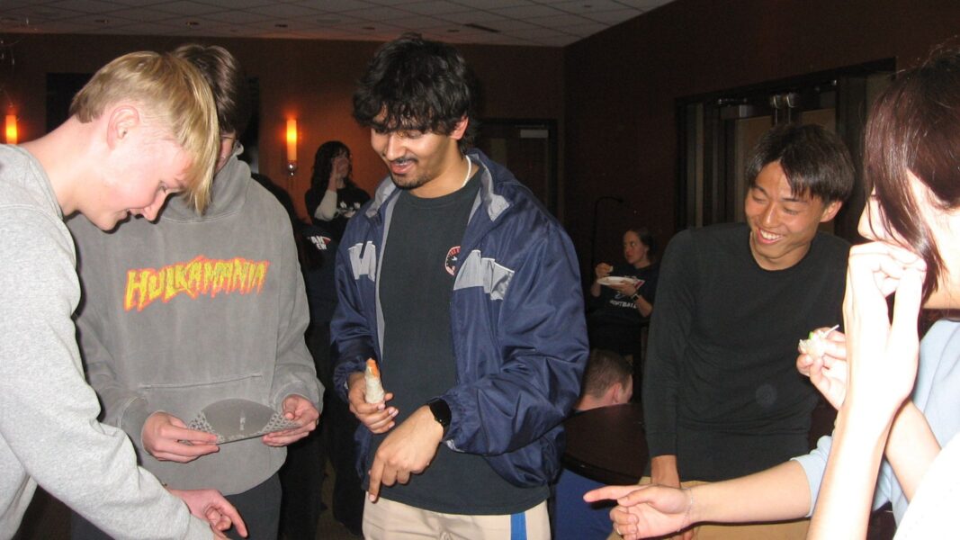 Students learned how to make spring rolls during a pre-spring break Campus Ministry collaboration with the Asian Student Association.