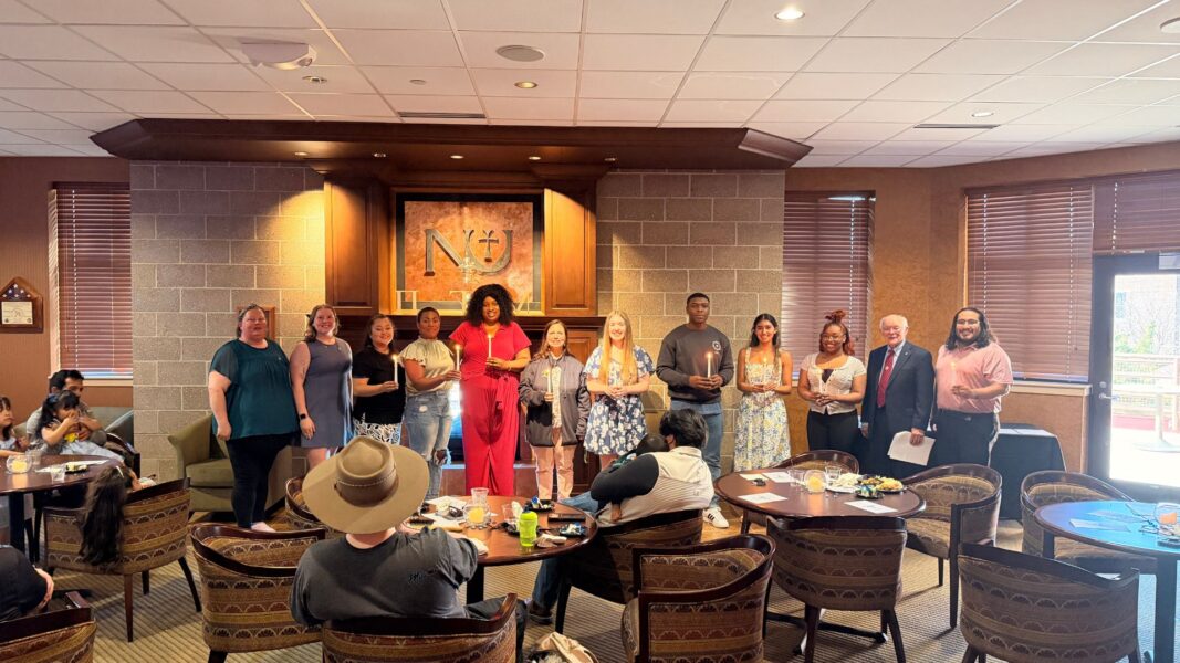 A group photo of all current Pi Gamma Mu society members