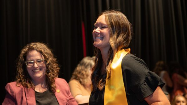 Smith smiles after receiving her ceremonial sonography pin from Newman University, May 2025.