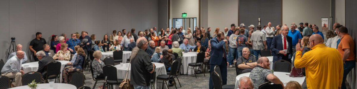 Guests gather for the mobile ag lab ribbon-cutting ceremony in Garden City.