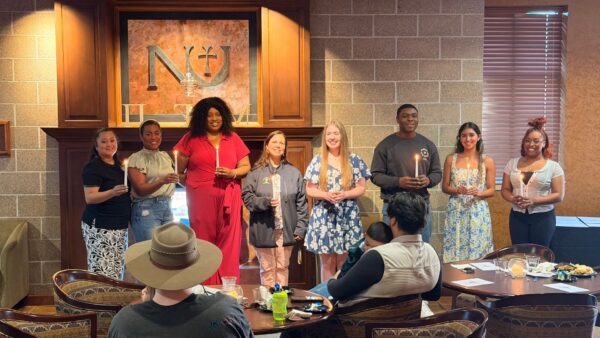 Nine new members were inducted into the Pi Gamma Mu society at Newman.