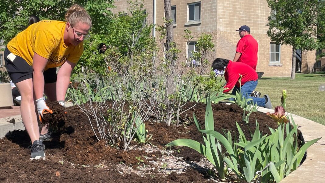 Brooks (left) helped organize the service project with Mayberry middle schoolers.