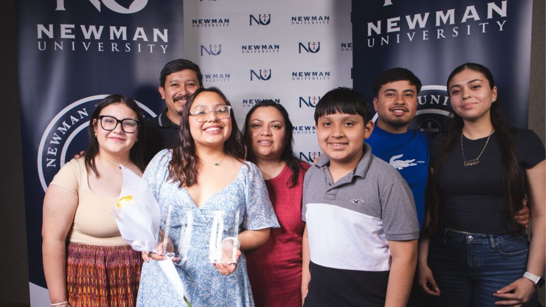 Pictured with family, Arguijo (third from left) received the 2026 St. Catherine's Medal.