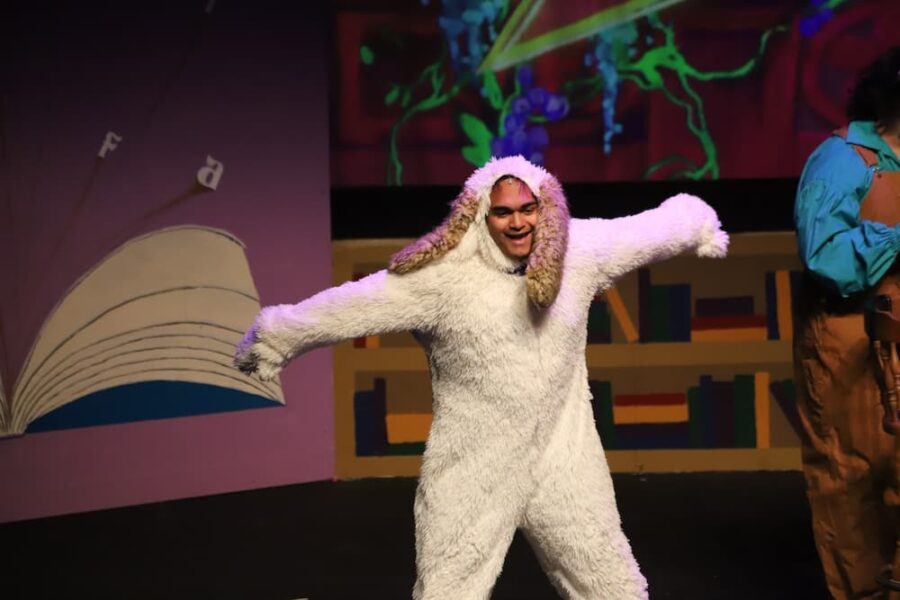 Cubias-Arteaga played a dog in the "Between the Lines" musical at Newman University.