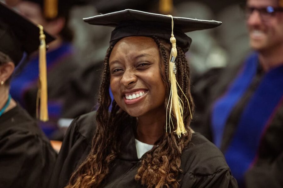 Robinson at Newman's commencement ceremony