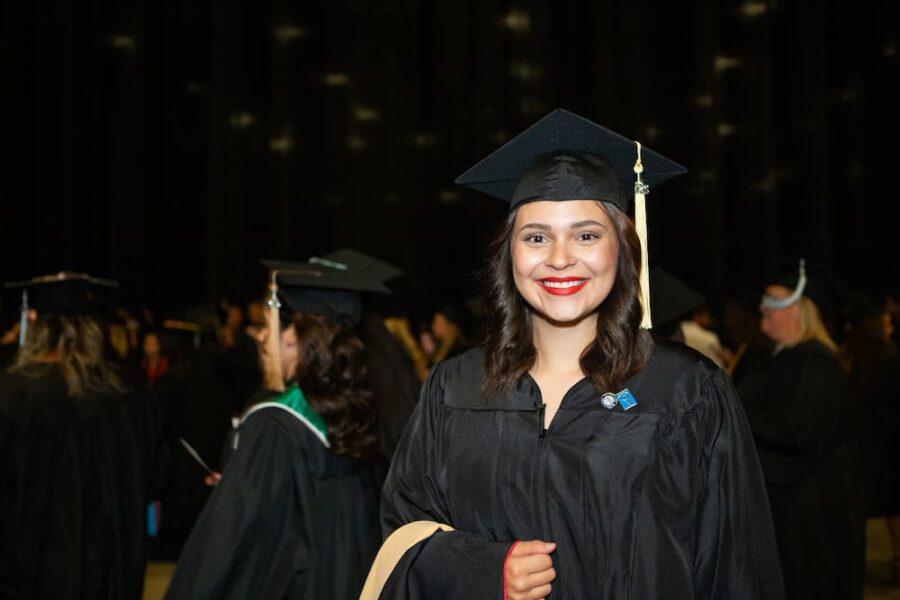 Fewin at Newman's commencement ceremony