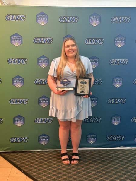 Pictures Jacobson posing with her awards