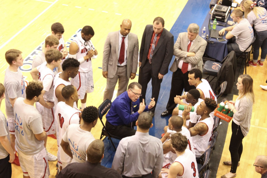 Pictures Potter on the court with Newman basketball players