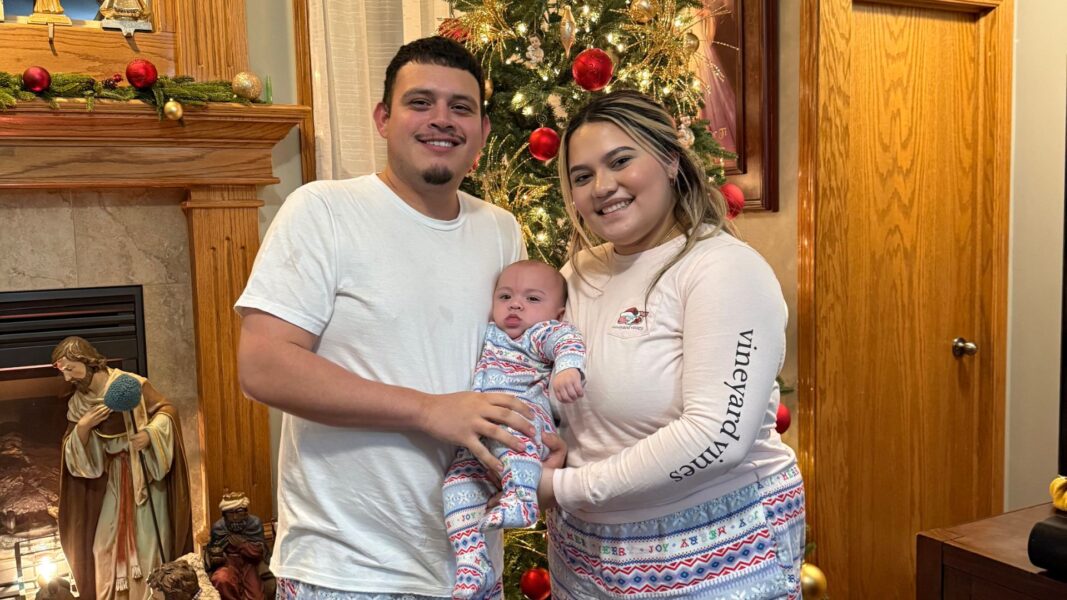 Flores-Lerma with her partner and baby boy