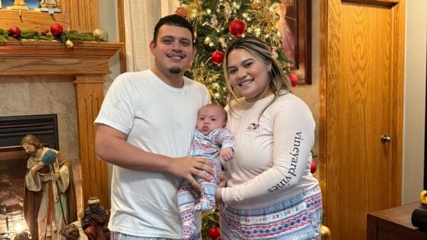 Flores-Lerma with her partner and baby boy