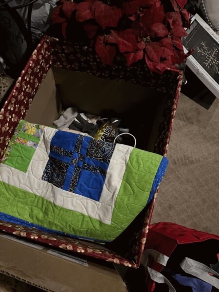 Weible collected hygiene products and warm clothing for elementary-aged students.