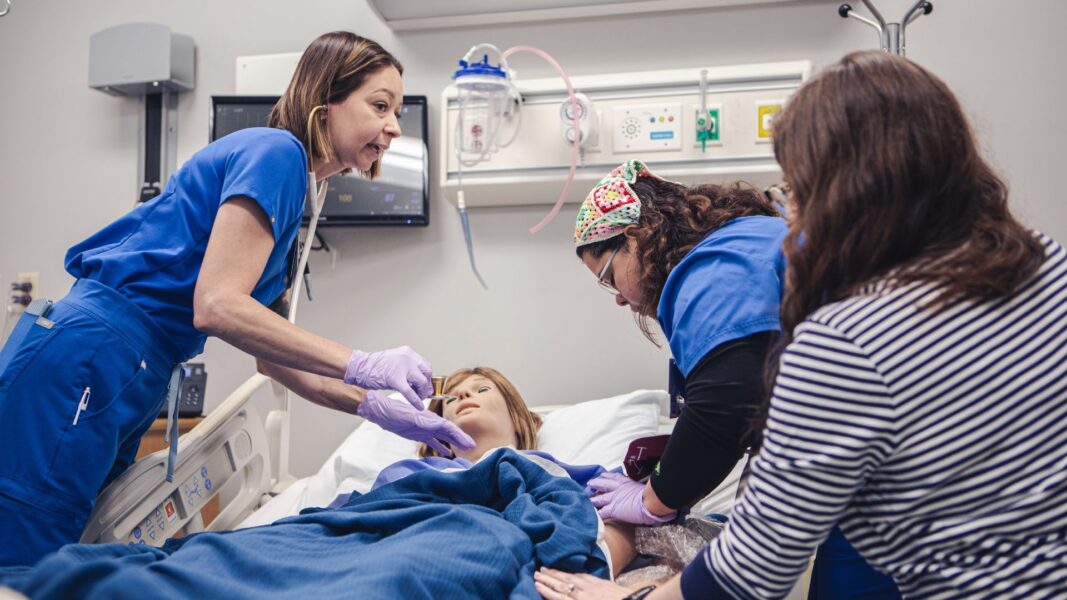 Students work together to treat their coding patient.