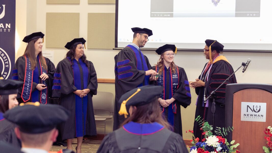 Brent recognizes DNAP graduates in front of their family and friends.