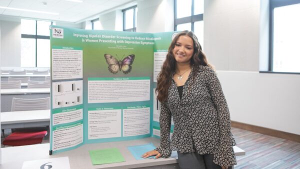 Student MichaelAnn Yates presented her research, "Improving Bipoloar Disorder Screening to Reduce Misdiagnosis in Women" during Scholars Day at Newman University.