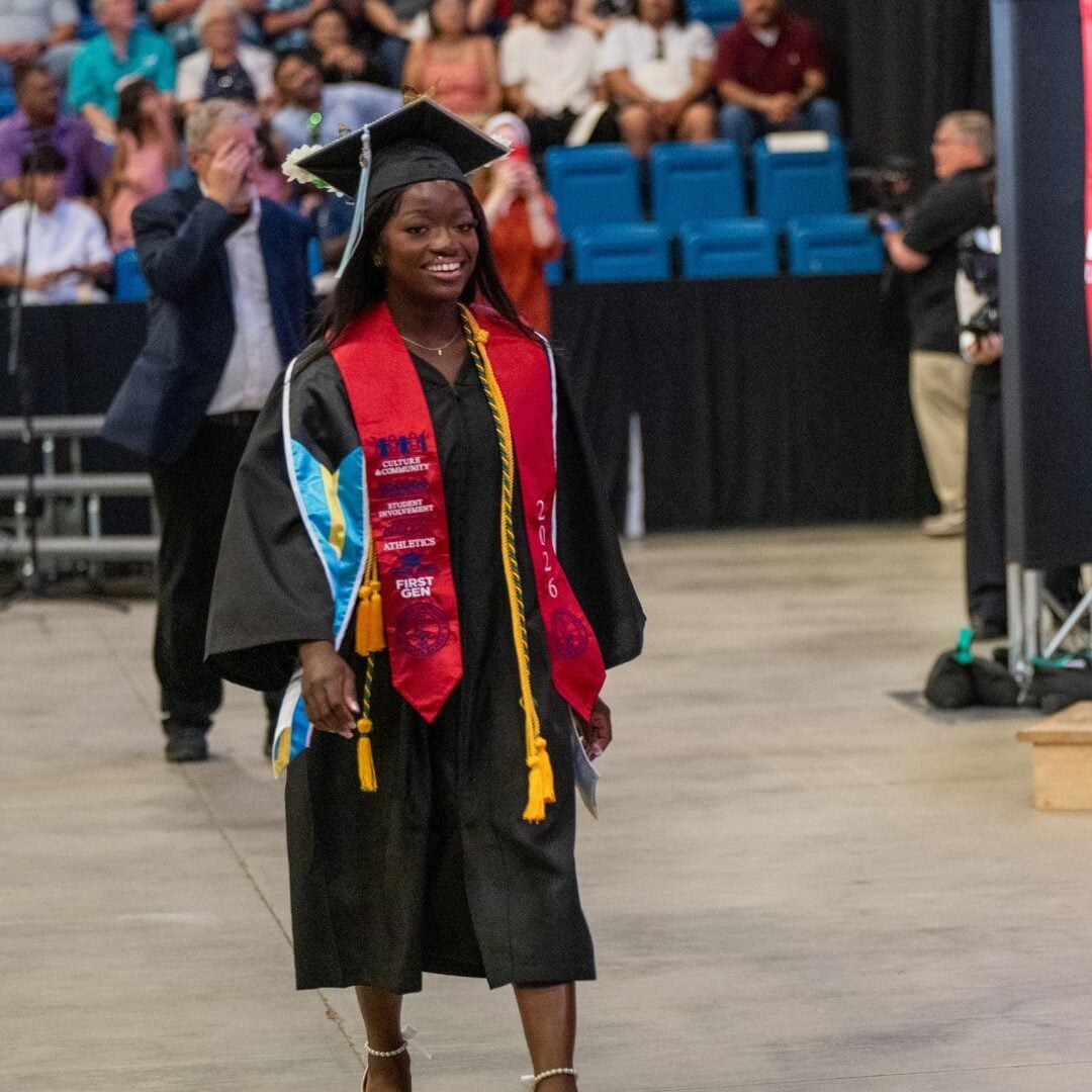 Smith at Newman's commencement ceremony on May 16