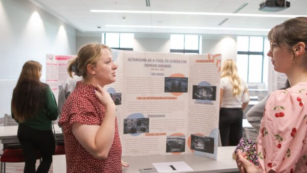 Student Miranda Hines presents during Scholars Day at Newman University.