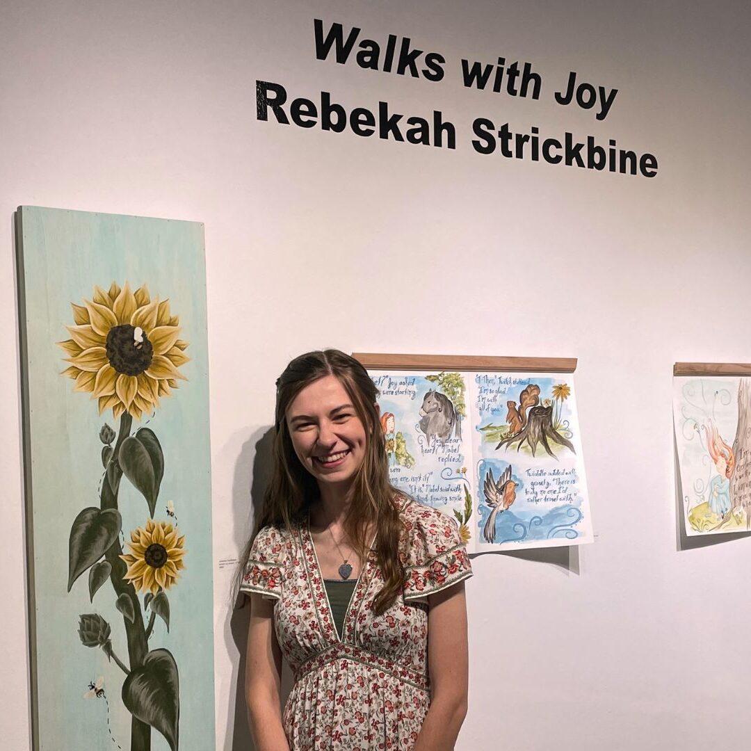 Strickbine in the Steckline Gallery during her First Friday exhibition, "Walks with Joy"